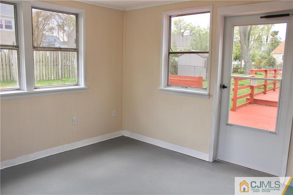 15 Roberts Road New Brunswick, NJ 08901 - Photo 23 of 25 an empty room with windows