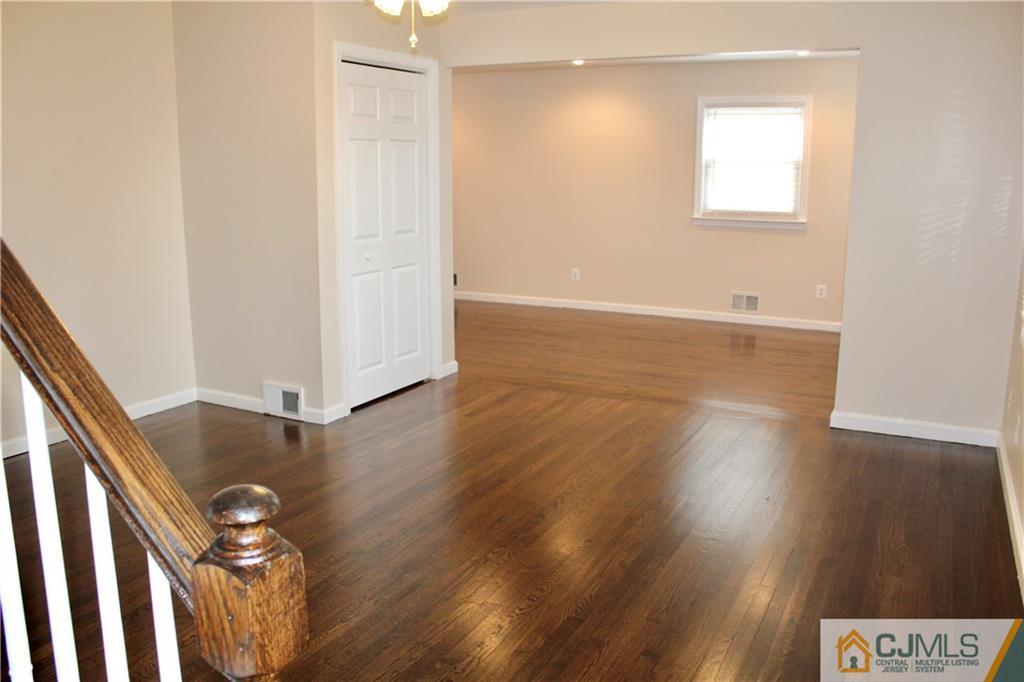 15 Roberts Road New Brunswick, NJ 08901 - Photo 4 of 25 an entryway of a house with wooden floor