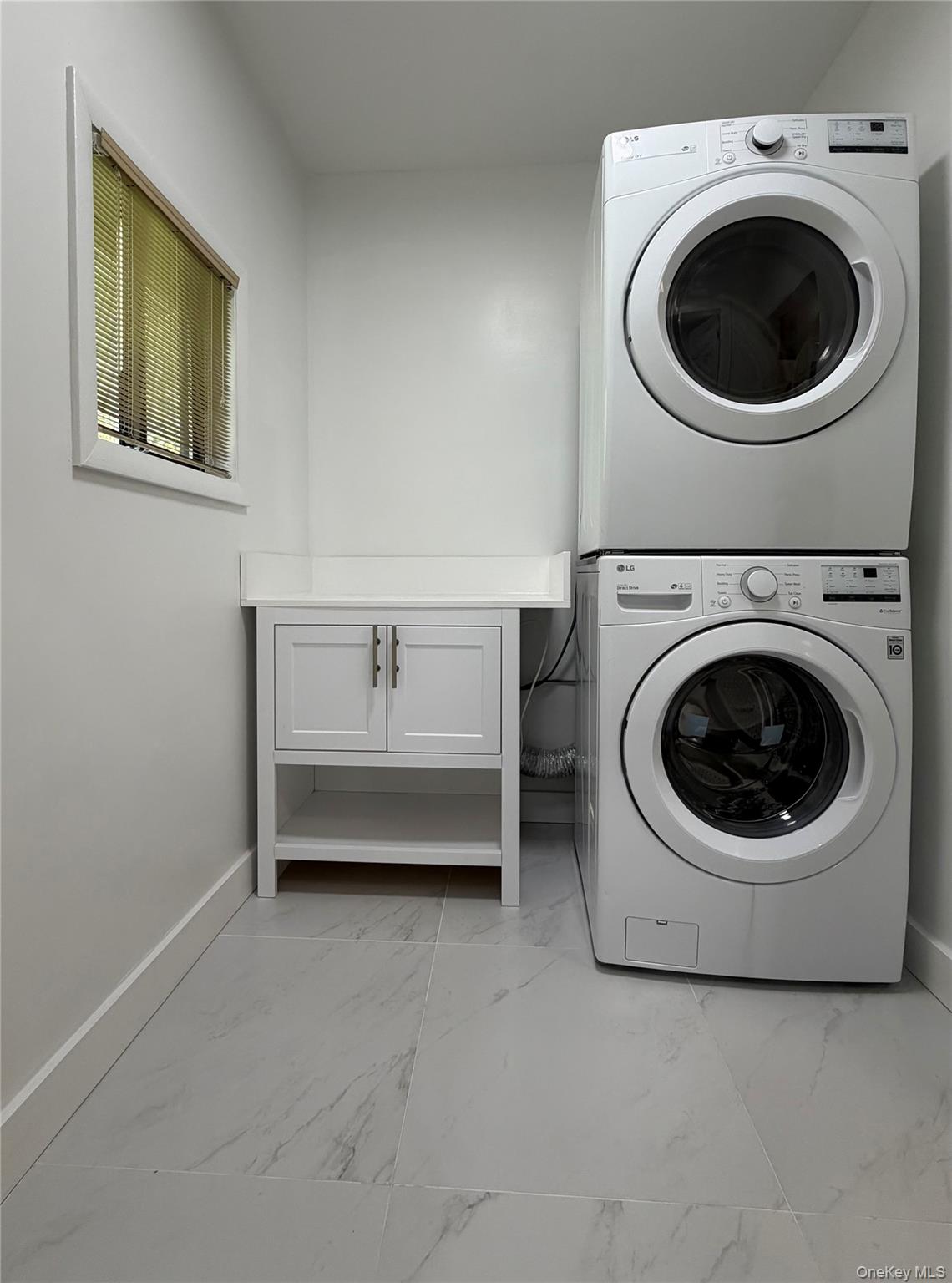 60 Medallion Road Kiamesha Lake, NY 12751 - Photo 9 of 44 a utility room with dryer and washer