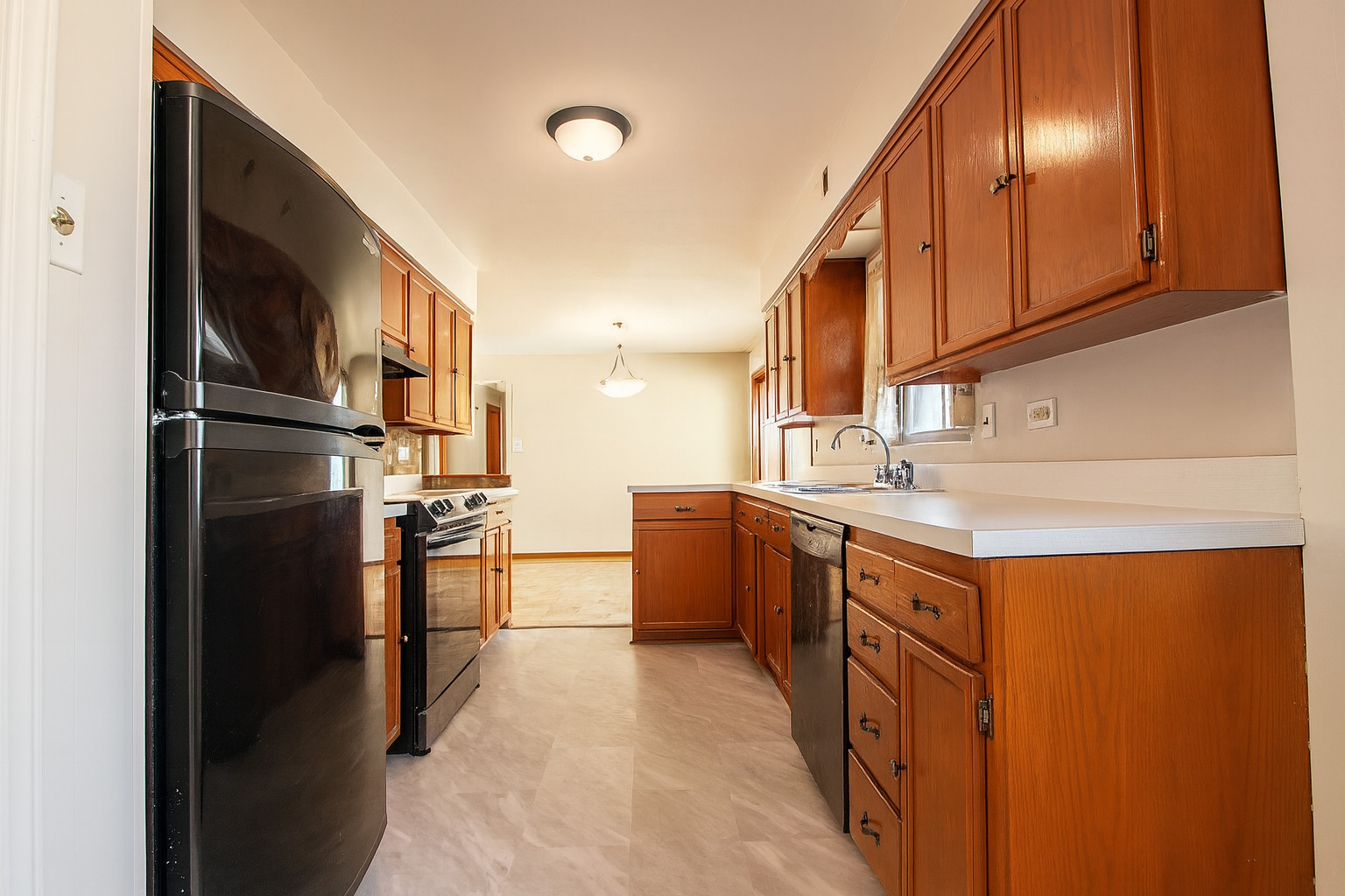 15547 Drexel Avenue Dolton, IL 60419 - Photo 12 of 18 a kitchen with stainless steel appliances granite countertop a refrigerator a stove and a sink