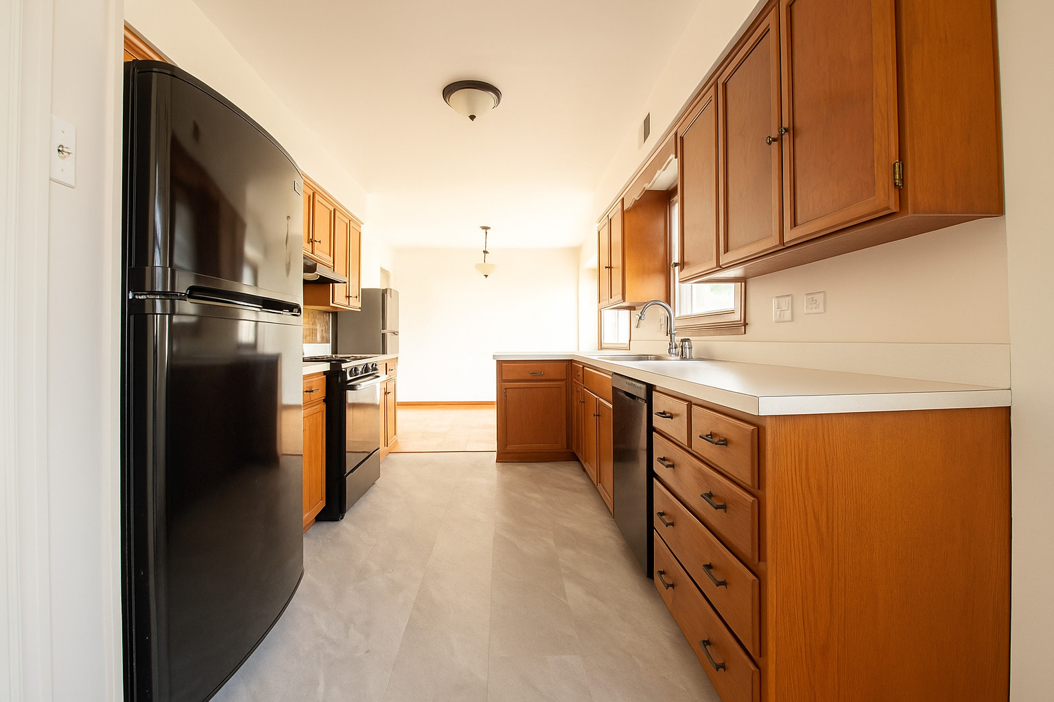 15547 Drexel Avenue Dolton, IL 60419 - Photo 10 of 18 a kitchen with stainless steel appliances granite countertop a refrigerator a stove and a sink