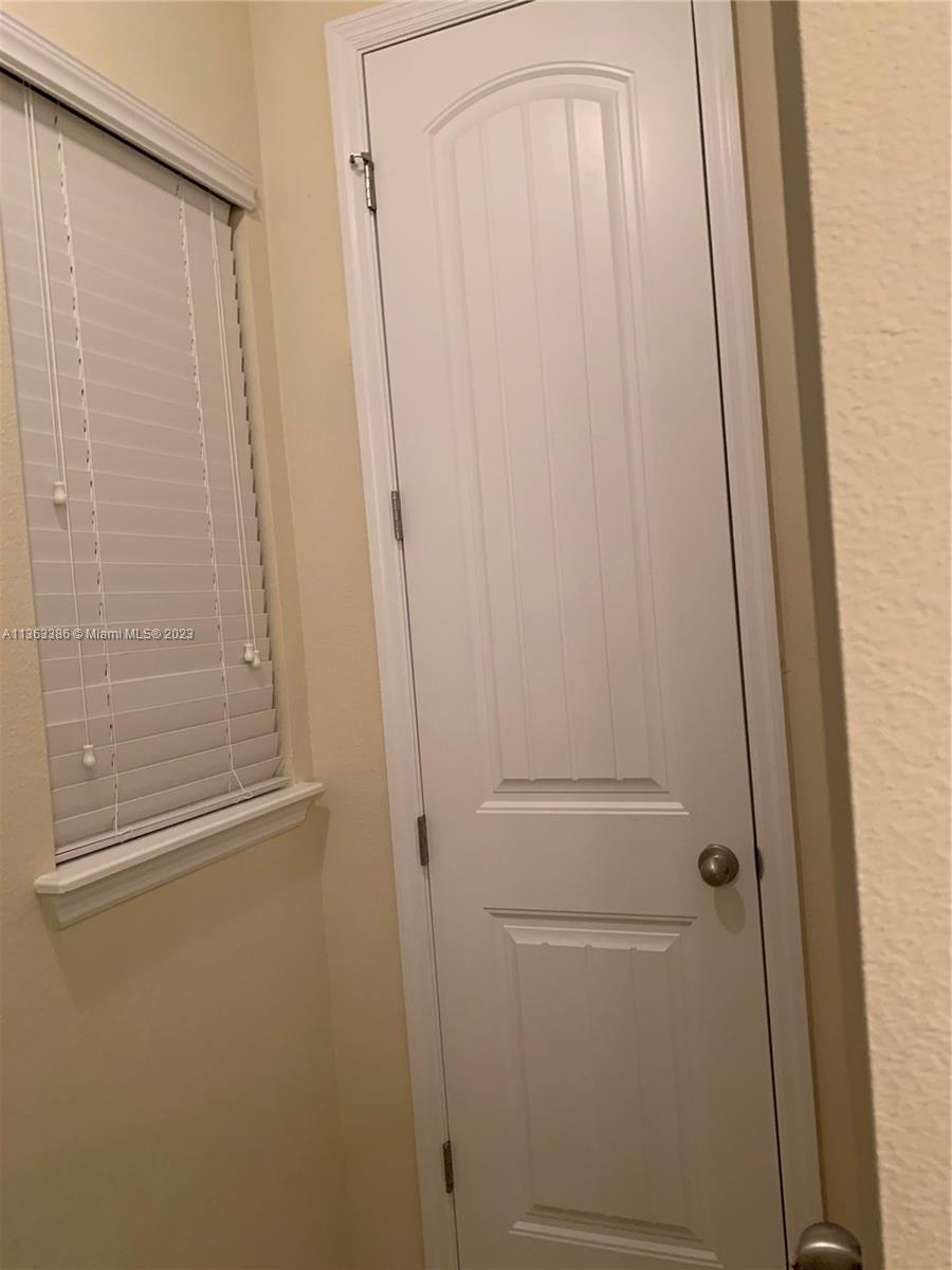 13832 Summerport Trail Loop Windermere, FL 34786 - Photo 24 of 39 a bathroom with a glass shower door