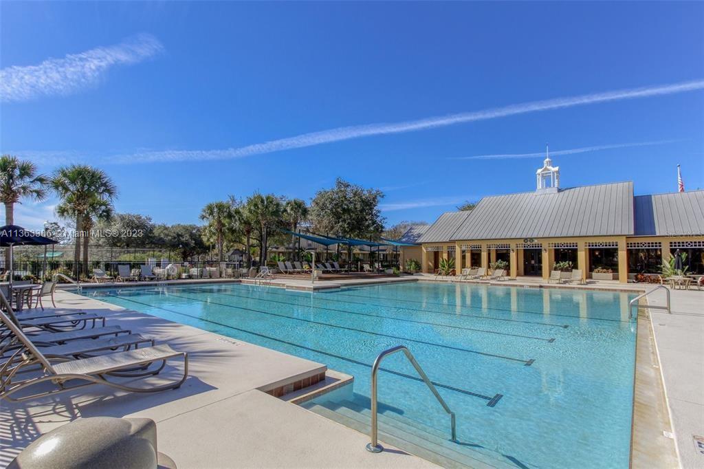 13832 Summerport Trail Loop Windermere, FL 34786 - Photo 35 of 39 a front view of a house with garden