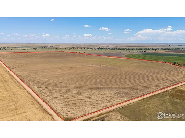 a view of an ocean and city