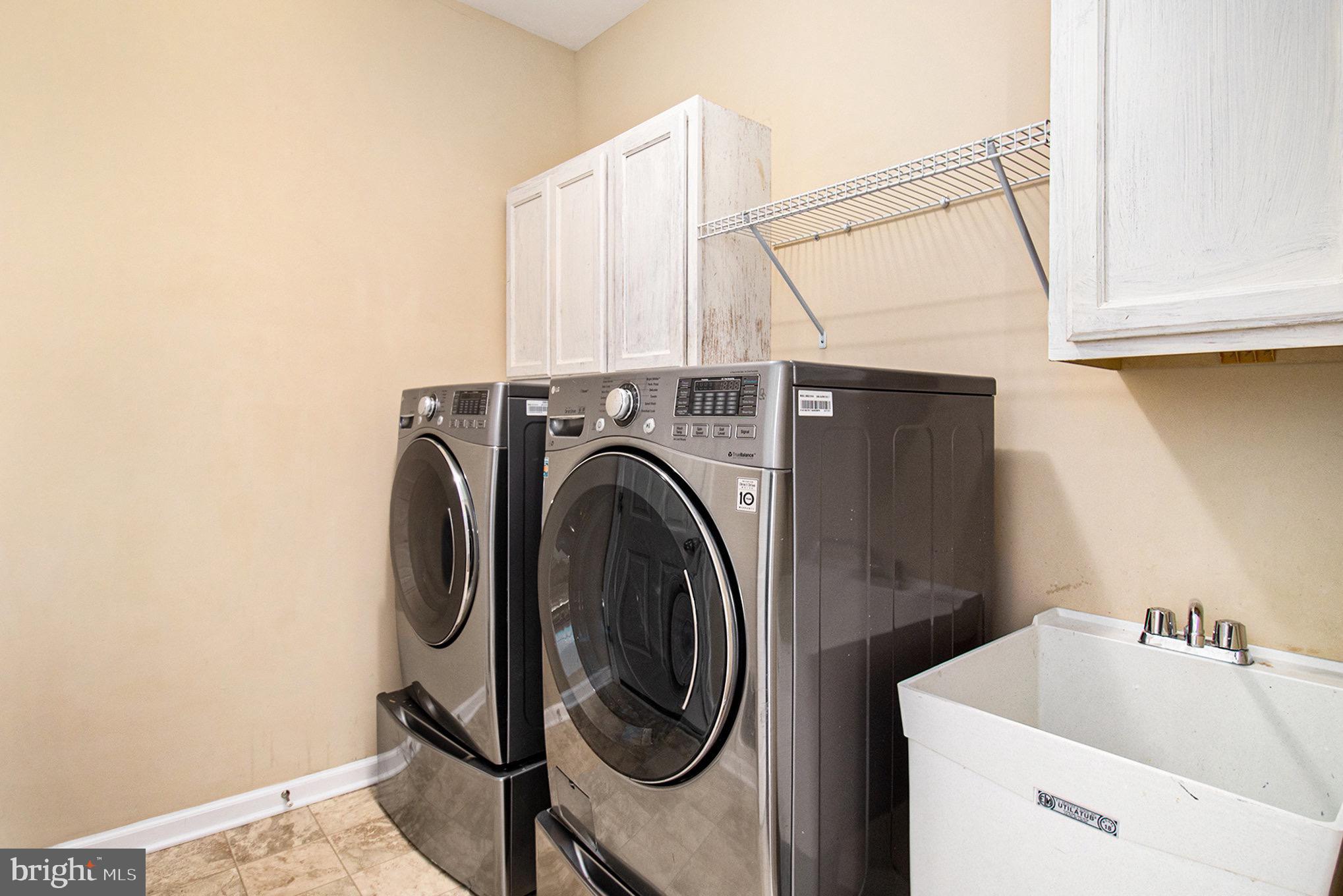 1226 Cabin Road Hatfield, PA 19440 - Photo 14 of 28 a utility room with dryer and washer