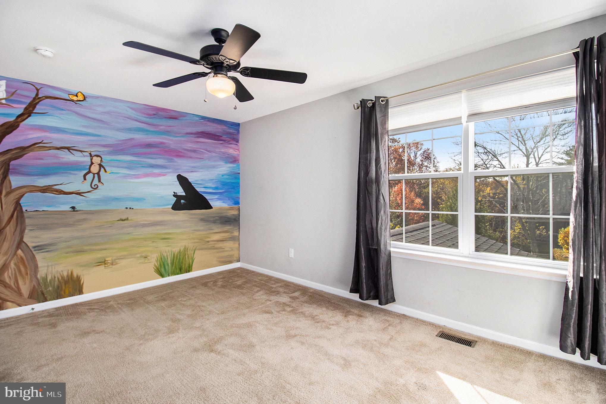 1226 Cabin Road Hatfield, PA 19440 - Photo 21 of 28 a view of a ceiling fan and a large window