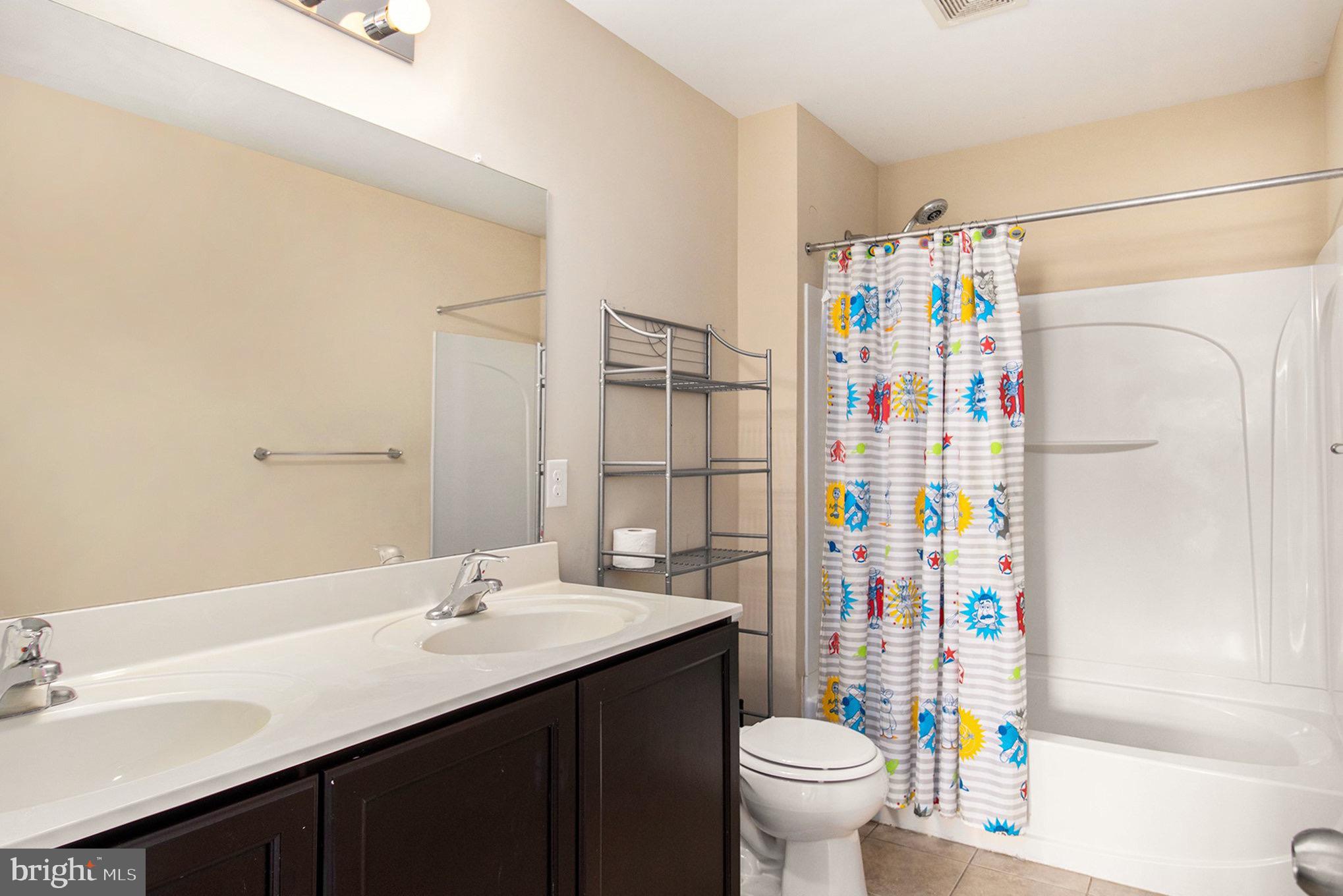 1226 Cabin Road Hatfield, PA 19440 - Photo 23 of 28 a bathroom with a sink toilet and shower