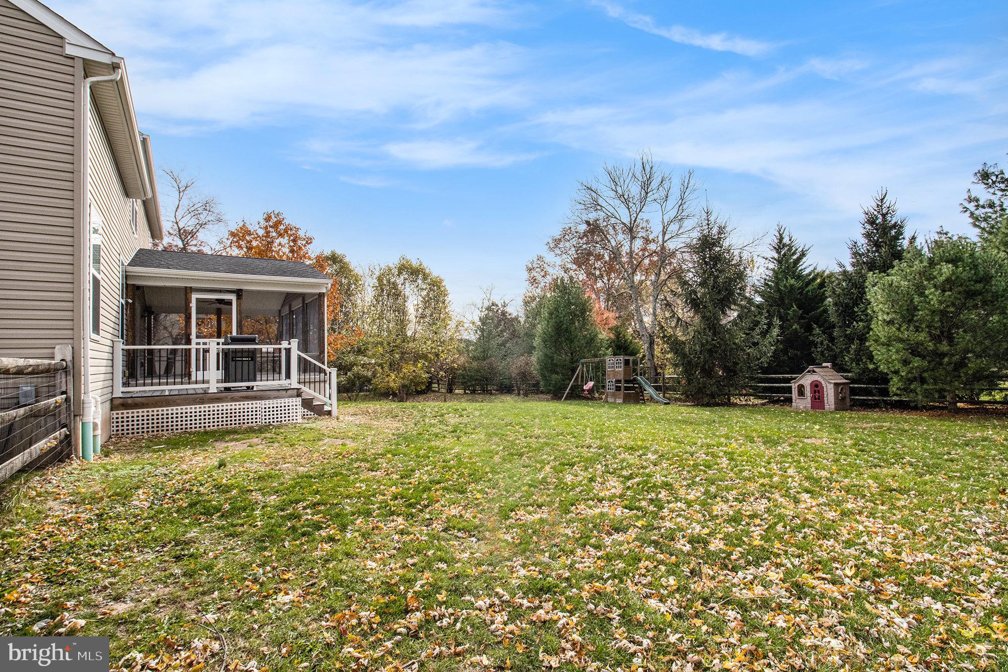 1226 Cabin Road Hatfield, PA 19440 - Photo 27 of 28 a front view of a house with a yard