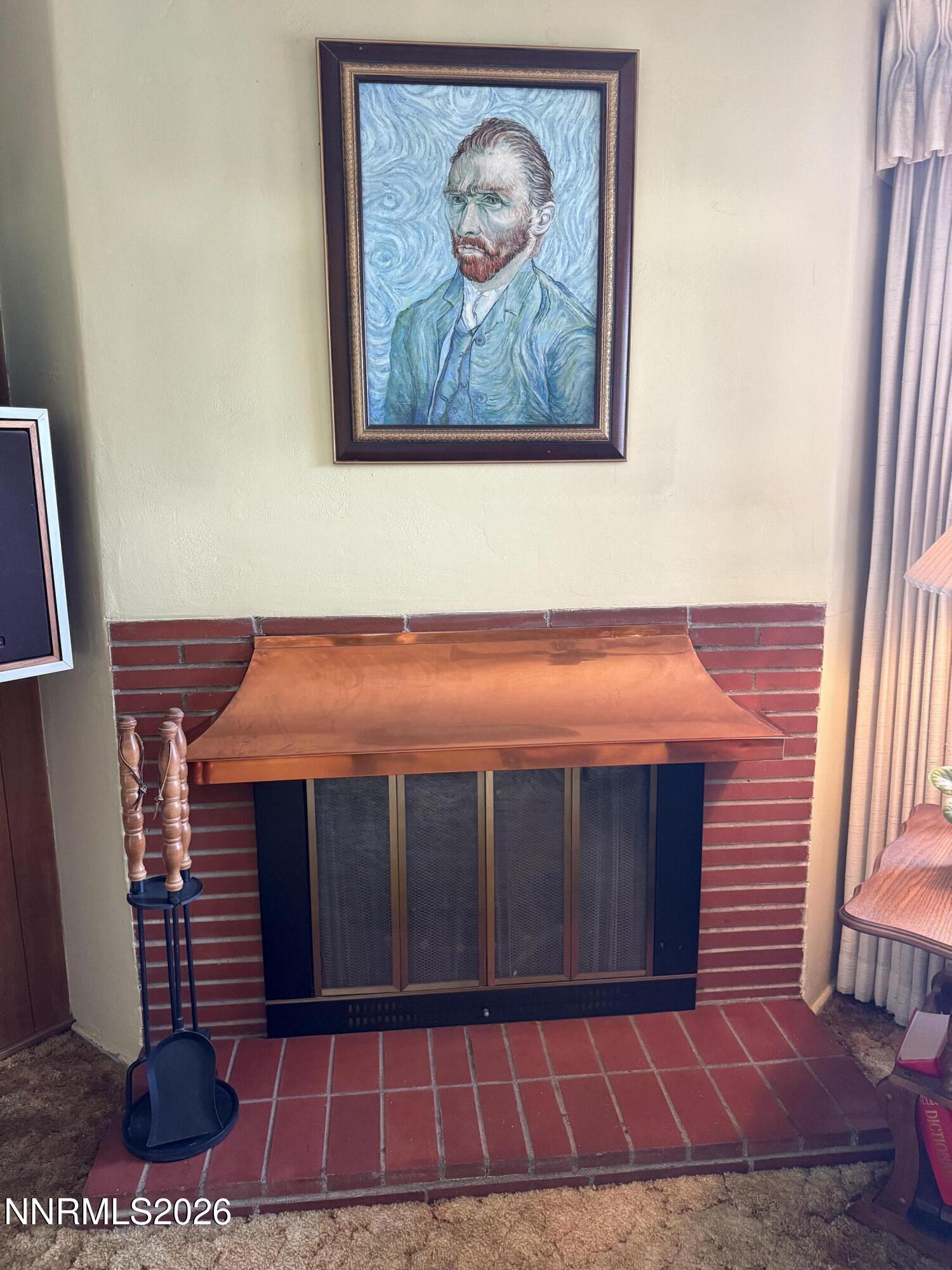 870 Capitol Hill Avenue Reno, NV 89502 - Photo 8 of 24 a view of a fireplace with a hallway