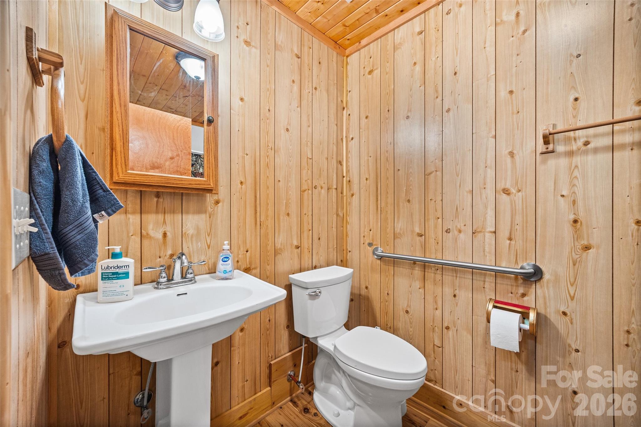 47-ac Killian Road Edgemoor, SC 29712 - Photo 14 of 37 a bathroom with a sink a toilet and shower curtain
