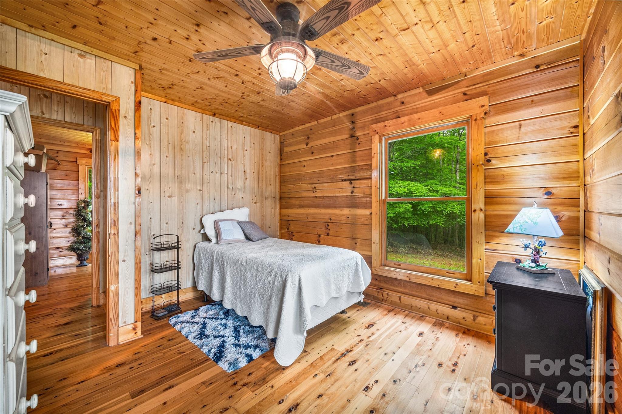 47-ac Killian Road Edgemoor, SC 29712 - Photo 16 of 37 a bedroom with a bed and wooden floor