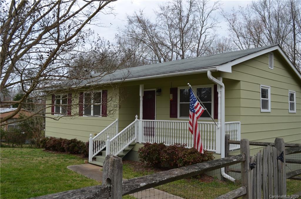 1773 Shearers Road Davidson, NC 28036 - Photo 2 of 19 a front view of a house with garden