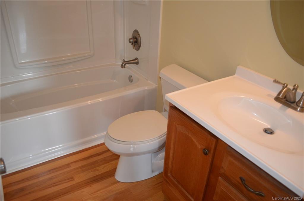 1773 Shearers Road Davidson, NC 28036 - Photo 19 of 19 a bathroom with a sink and a toilet