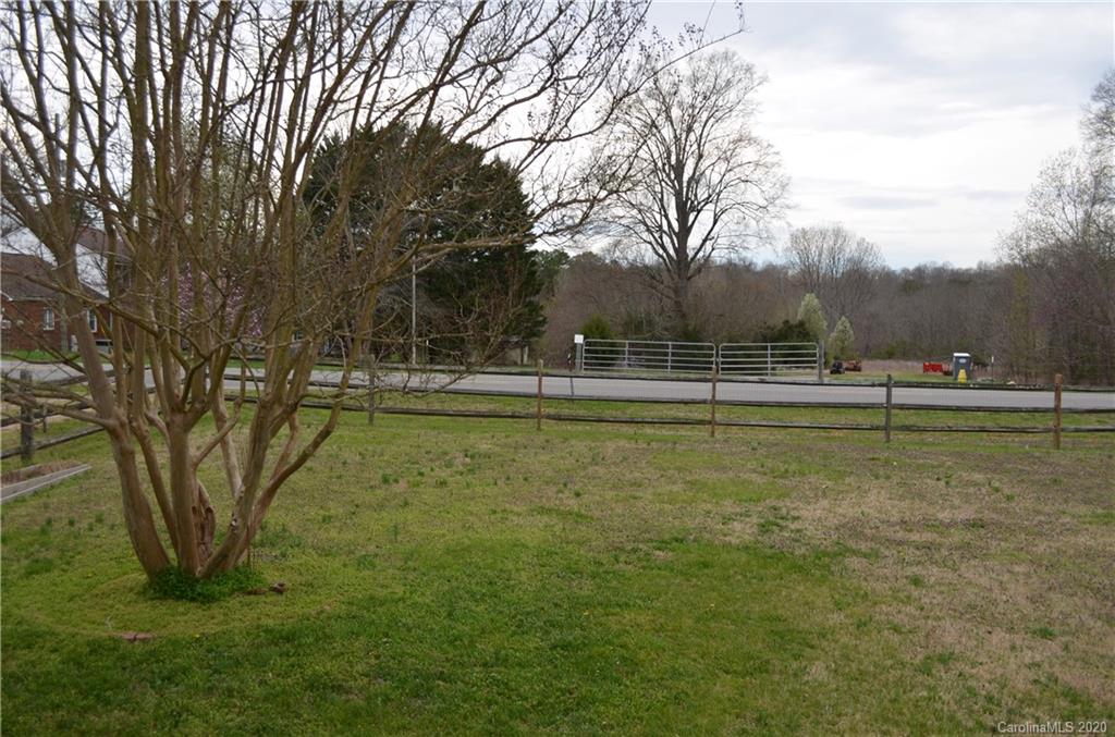 1773 Shearers Road Davidson, NC 28036 - Photo 4 of 19 a view of a playground with basketball court