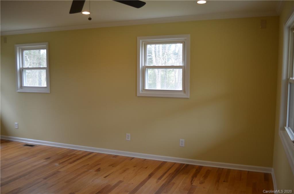 1773 Shearers Road Davidson, NC 28036 - Photo 5 of 19 an empty room with a window