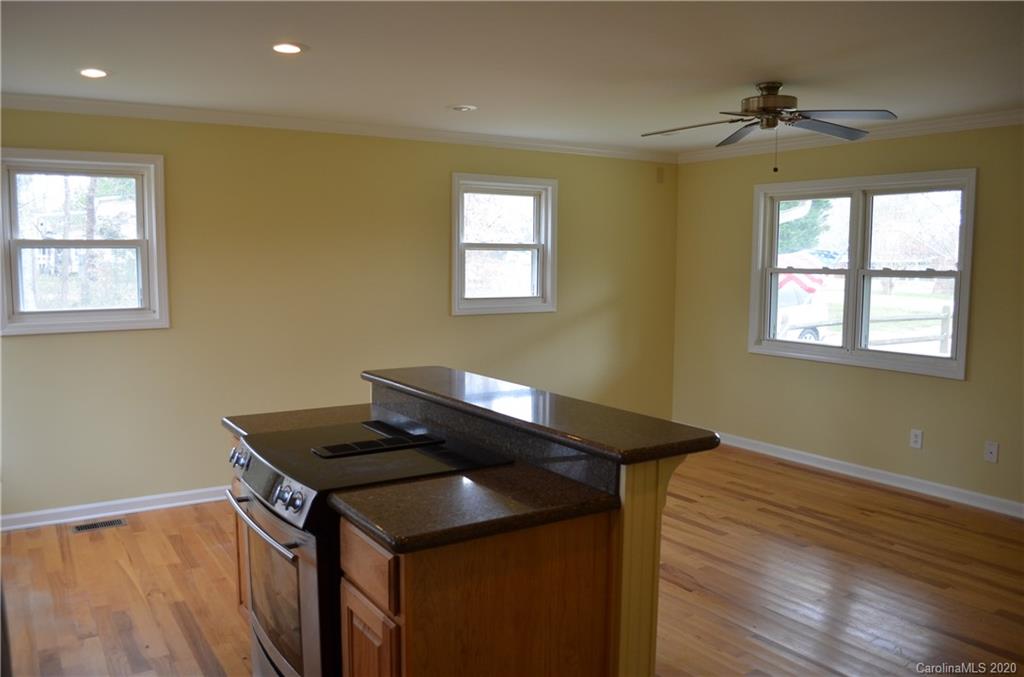 1773 Shearers Road Davidson, NC 28036 - Photo 8 of 19 a kitchen that has a sink and a stove top oven