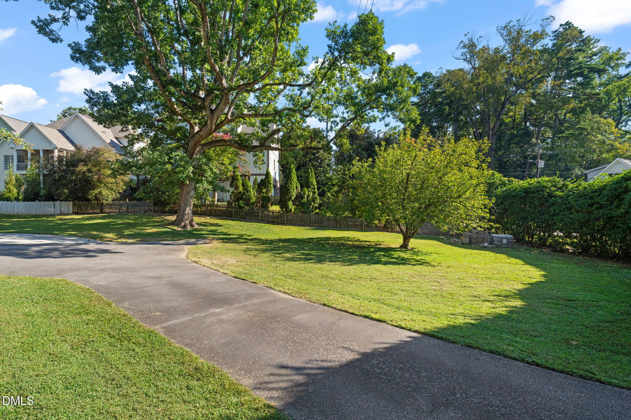 406 Chesterfield Road Raleigh, NC 27608 - Photo 12 of 25 a view of a playground with basketball court