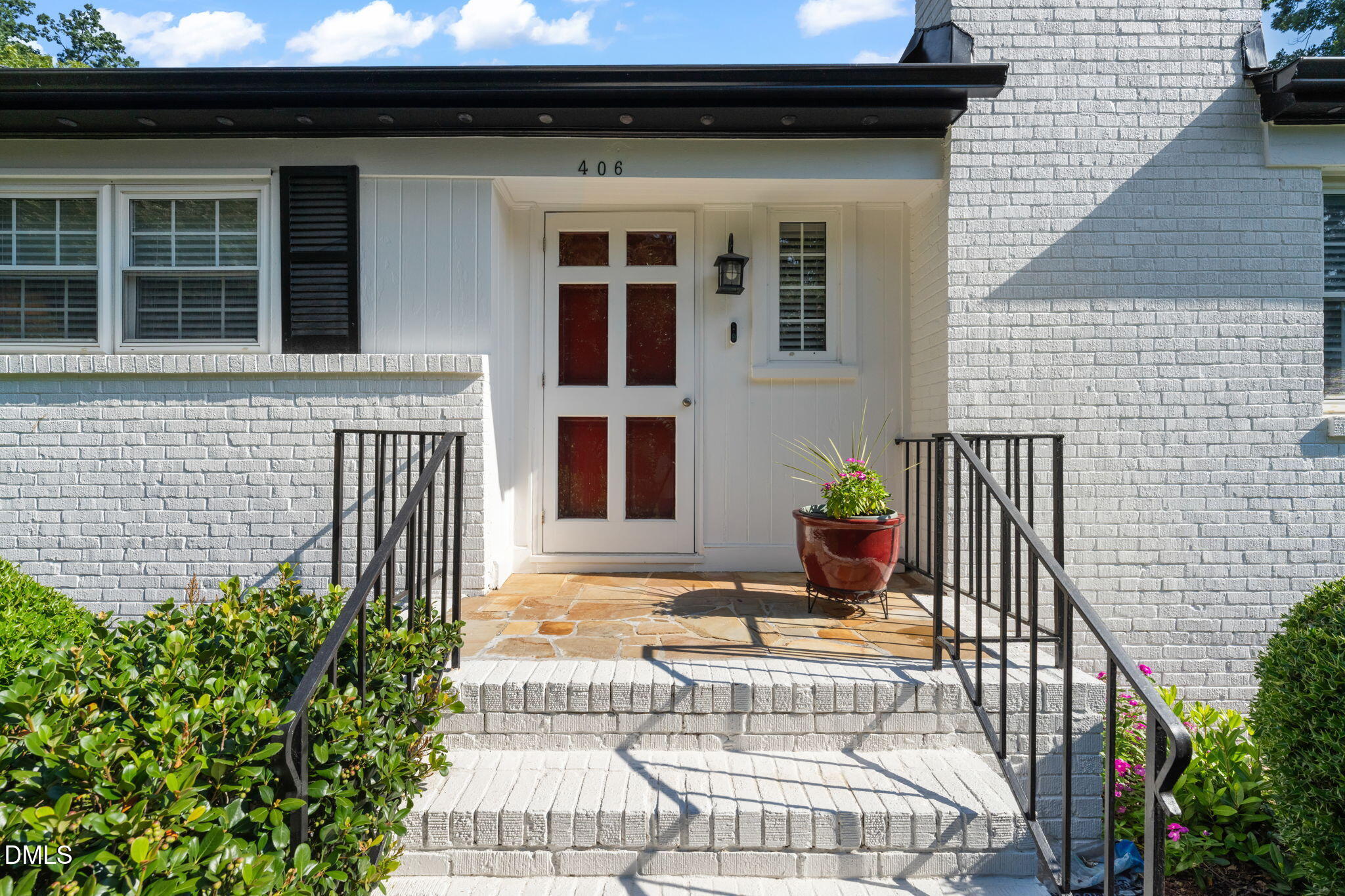406 Chesterfield Road Raleigh, NC 27608 - Photo 2 of 25 a view of a house with a patio