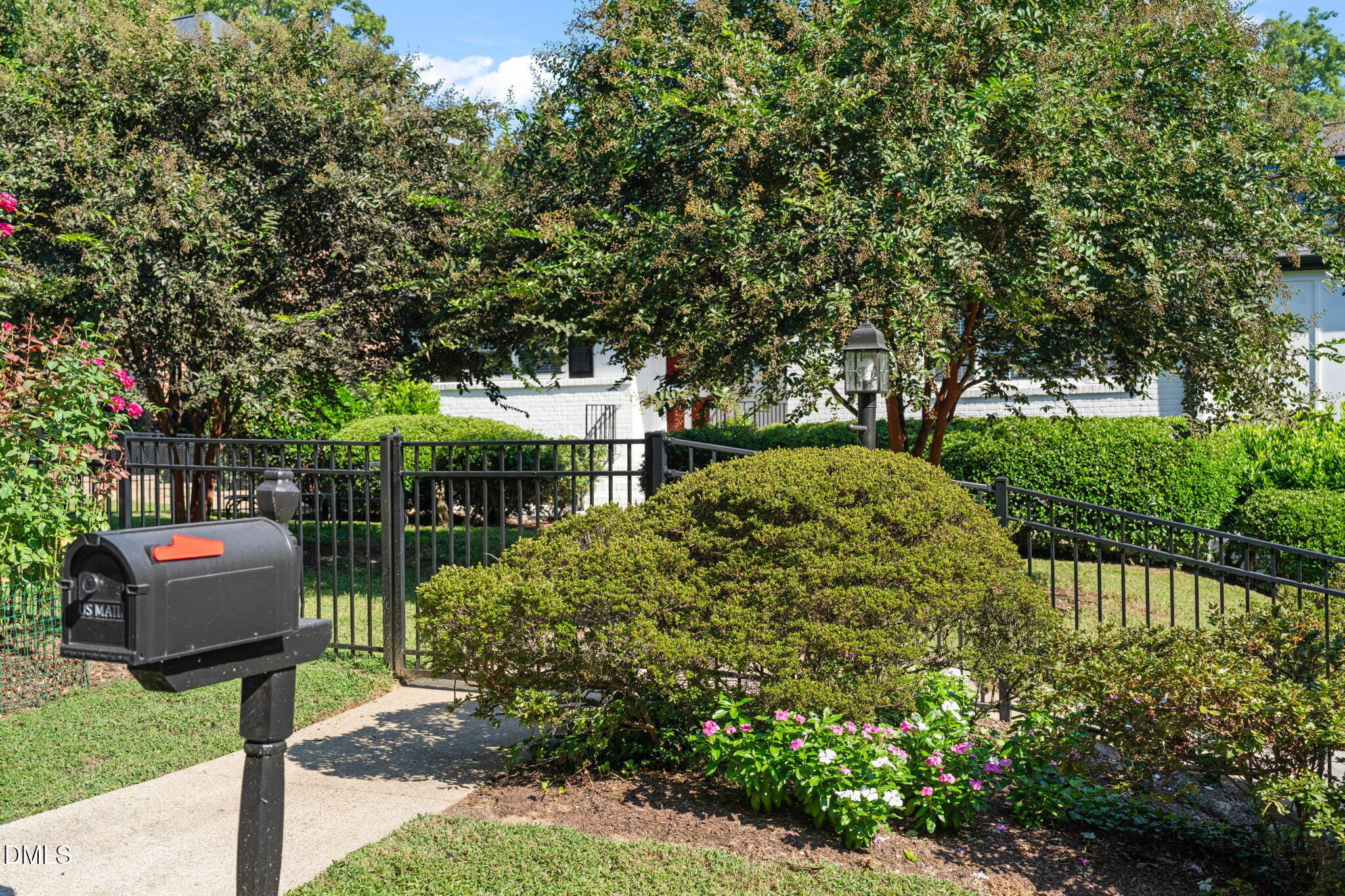 406 Chesterfield Road Raleigh, NC 27608 - Photo 22 of 25 a backyard of a house with lots of green space