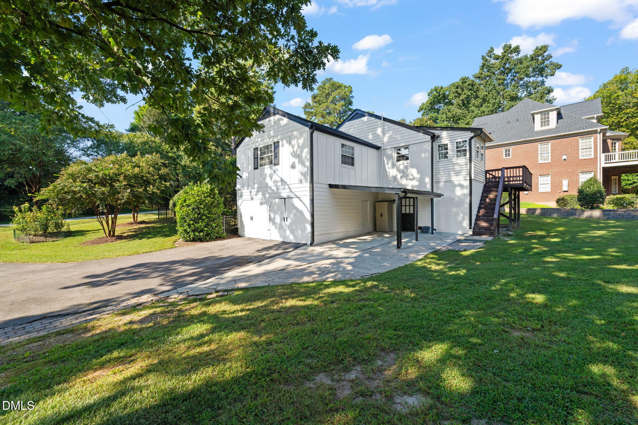406 Chesterfield Road Raleigh, NC 27608 - Photo 7 of 25 a view of a house with a yard