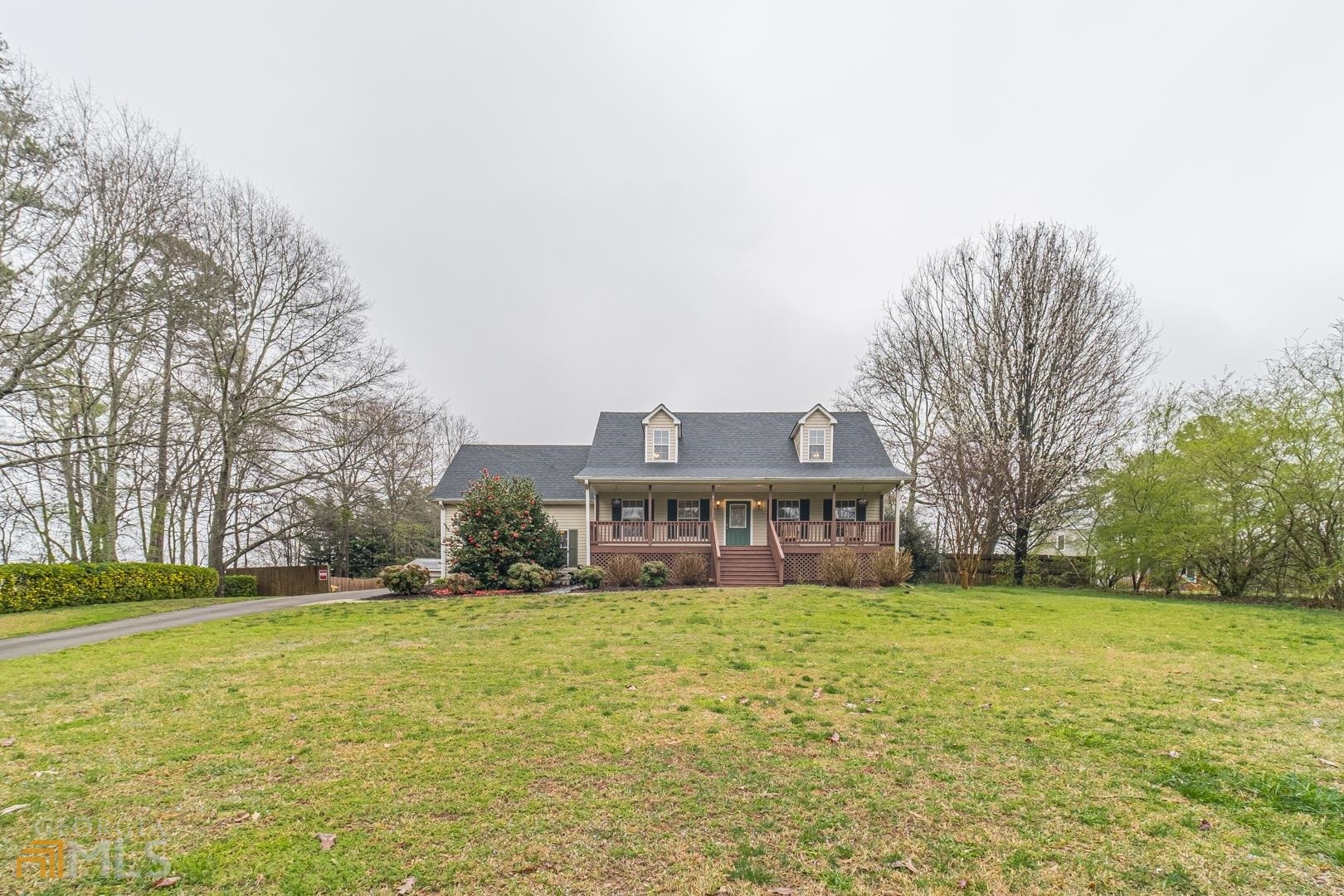 411 Pendergrass Road, Unit 403 Winder, GA 30680 - Photo 1 of 1 a view of a house with a yard