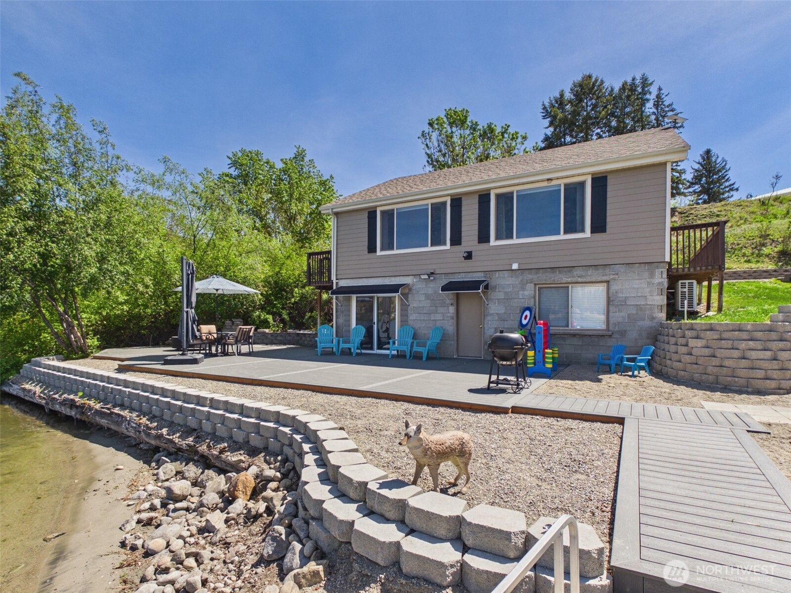 6 Marions Cove Road Republic, WA 99166 - Photo 24 of 33 a front view of a house with a yard