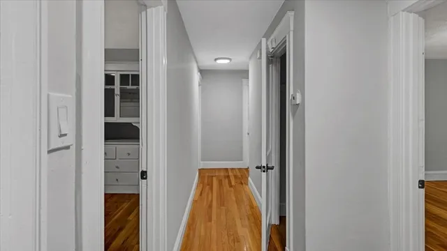 a view of hallway with walk in closet