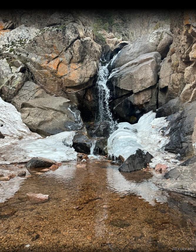 Rock Ridge Road Palmer Lake, CO 80133 - Photo 5 of 23 a view of water body of water with water fall