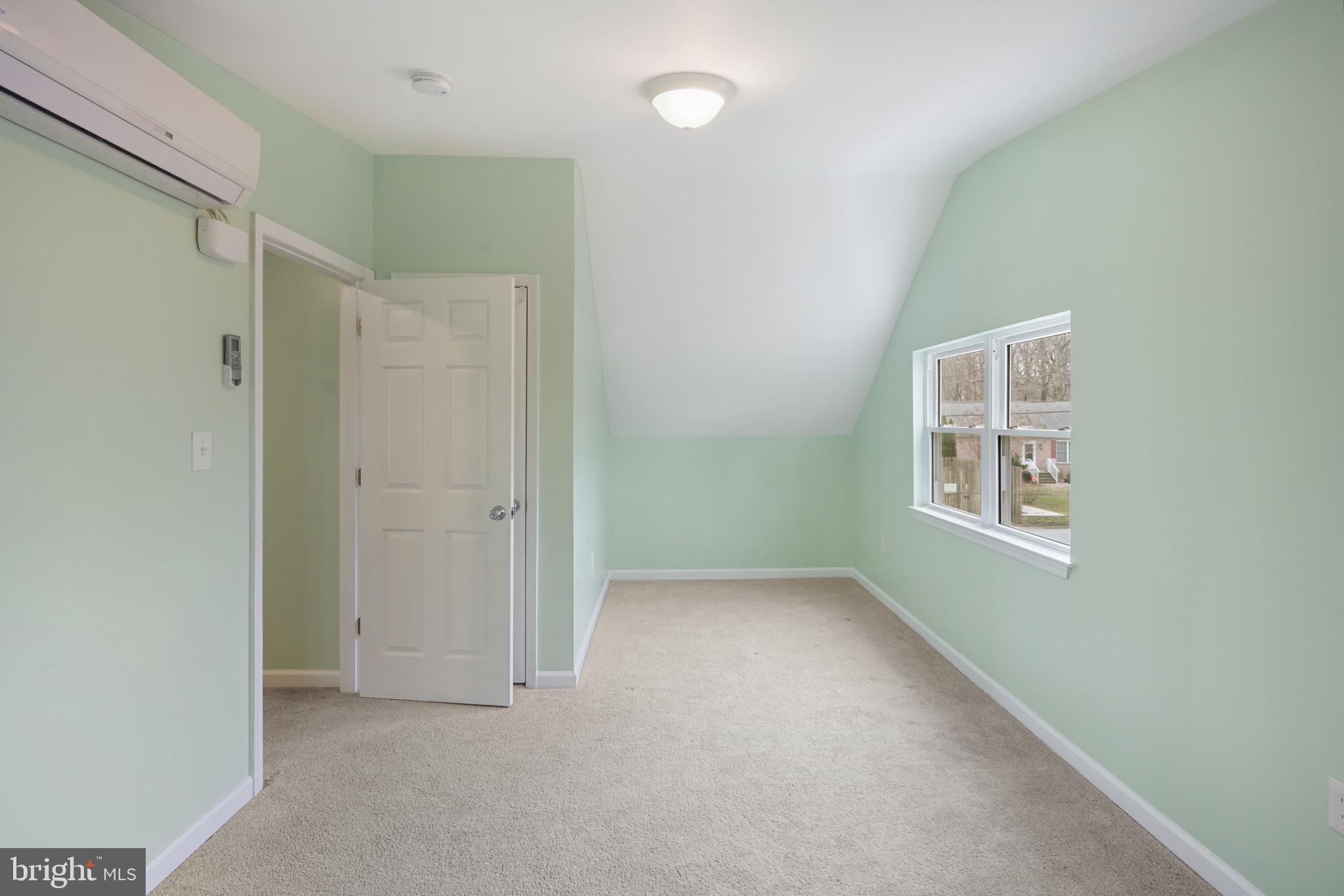 323 Wye Road Essex, MD 21221 - Photo 22 of 35 a view of an empty room with a window