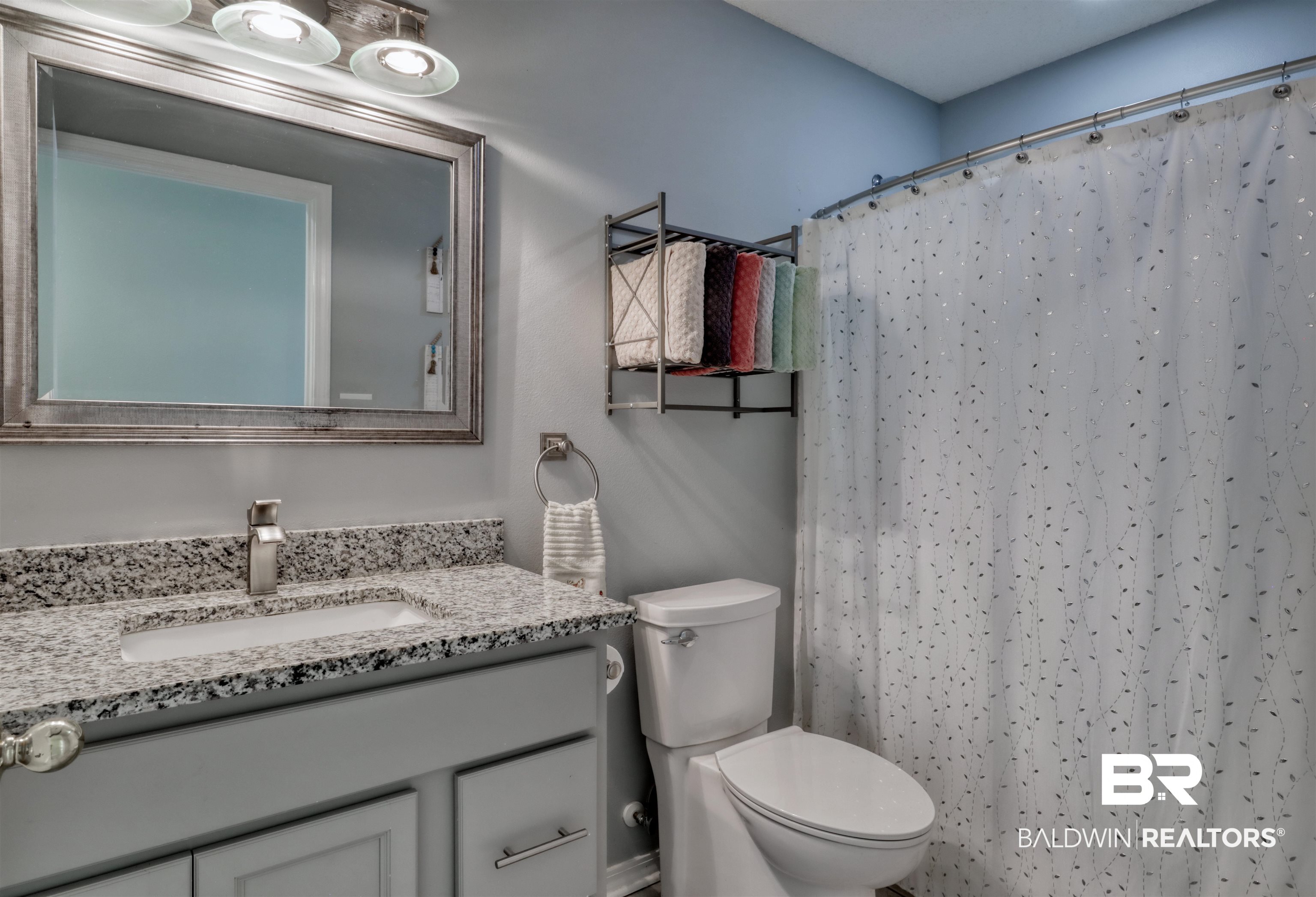 12893 Hunters Chase Foley, AL 36535 - Photo 27 of 42 Full bathroom with toilet, vanity, and a shower with shower curtain