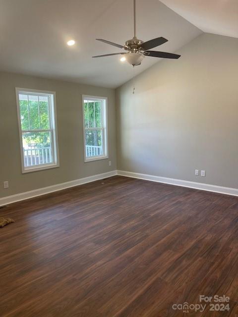 1545 West Ridge Road Salisbury, NC 28147 - Photo 5 of 18 an empty room with wooden floor fan and windows