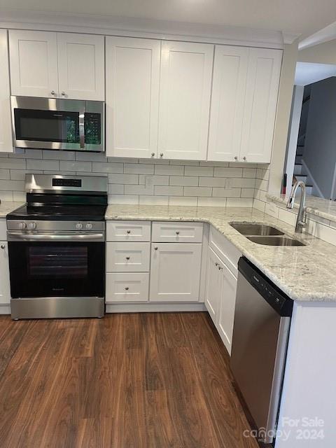 1545 West Ridge Road Salisbury, NC 28147 - Photo 7 of 18 a kitchen with a sink stove and microwave
