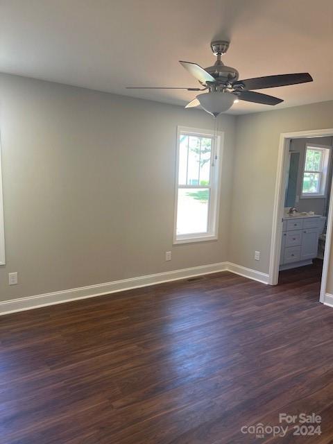 1545 West Ridge Road Salisbury, NC 28147 - Photo 8 of 18 a view of an empty room with wooden floor and a window