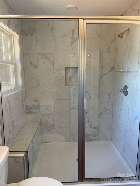 1545 West Ridge Road Salisbury, NC 28147 - Photo 10 of 18 a bathroom with a shower and a toilet