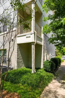 front view of a house with a small yard