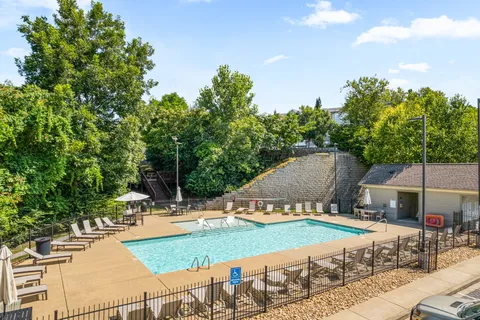 an outdoor space with patio and outdoor seating