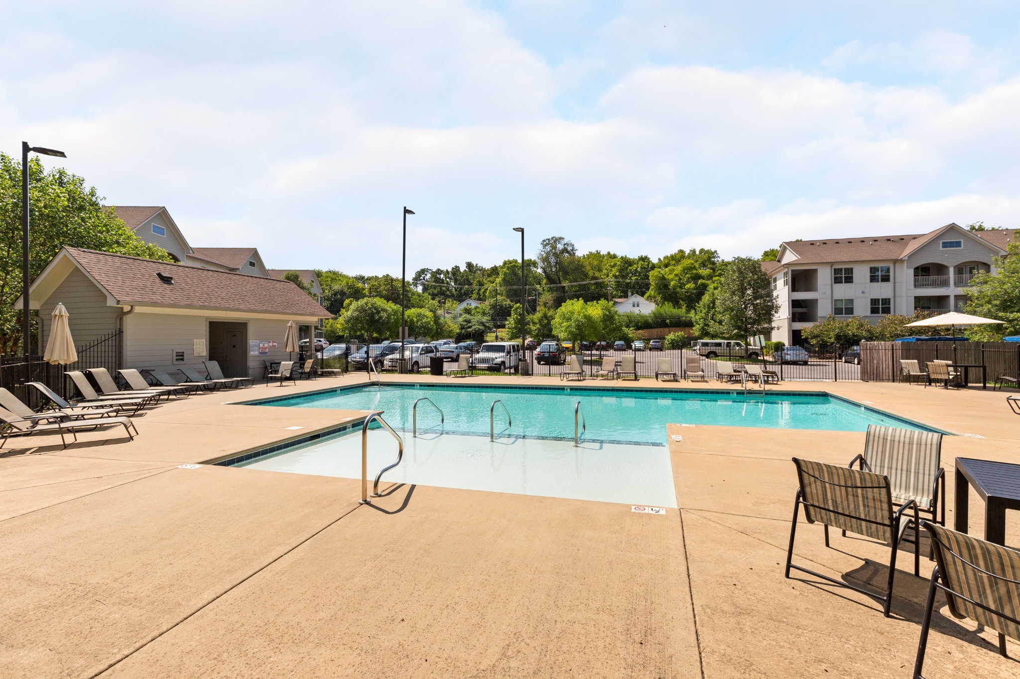 414 Rosedale Avenue, Unit 211 Nashville, TN 37211 - Photo 17 of 23 a swimming pool with outdoor seating and yard