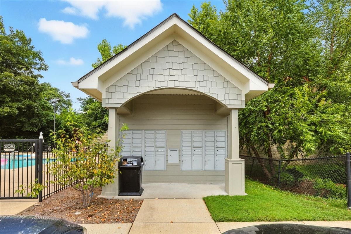 414 Rosedale Avenue, Unit 211 Nashville, TN 37211 - Photo 18 of 23 a front view of a house with garden
