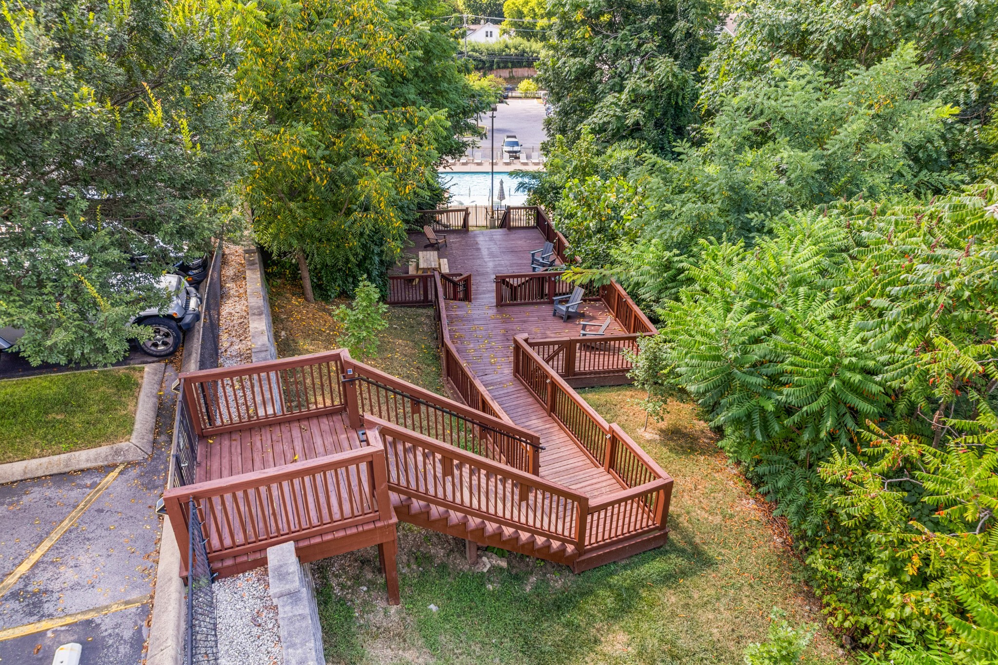 414 Rosedale Avenue, Unit 211 Nashville, TN 37211 - Photo 20 of 23 a view of a roof deck with chair and wooden floor