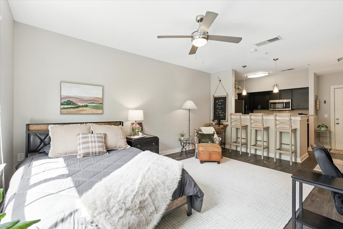 414 Rosedale Avenue, Unit 211 Nashville, TN 37211 - Photo 9 of 23 a bedroom with a bed and a view of kitchen