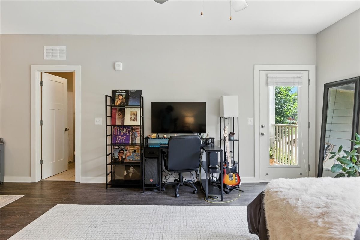 414 Rosedale Avenue, Unit 211 Nashville, TN 37211 - Photo 10 of 23 a living room with furniture and a flat screen tv