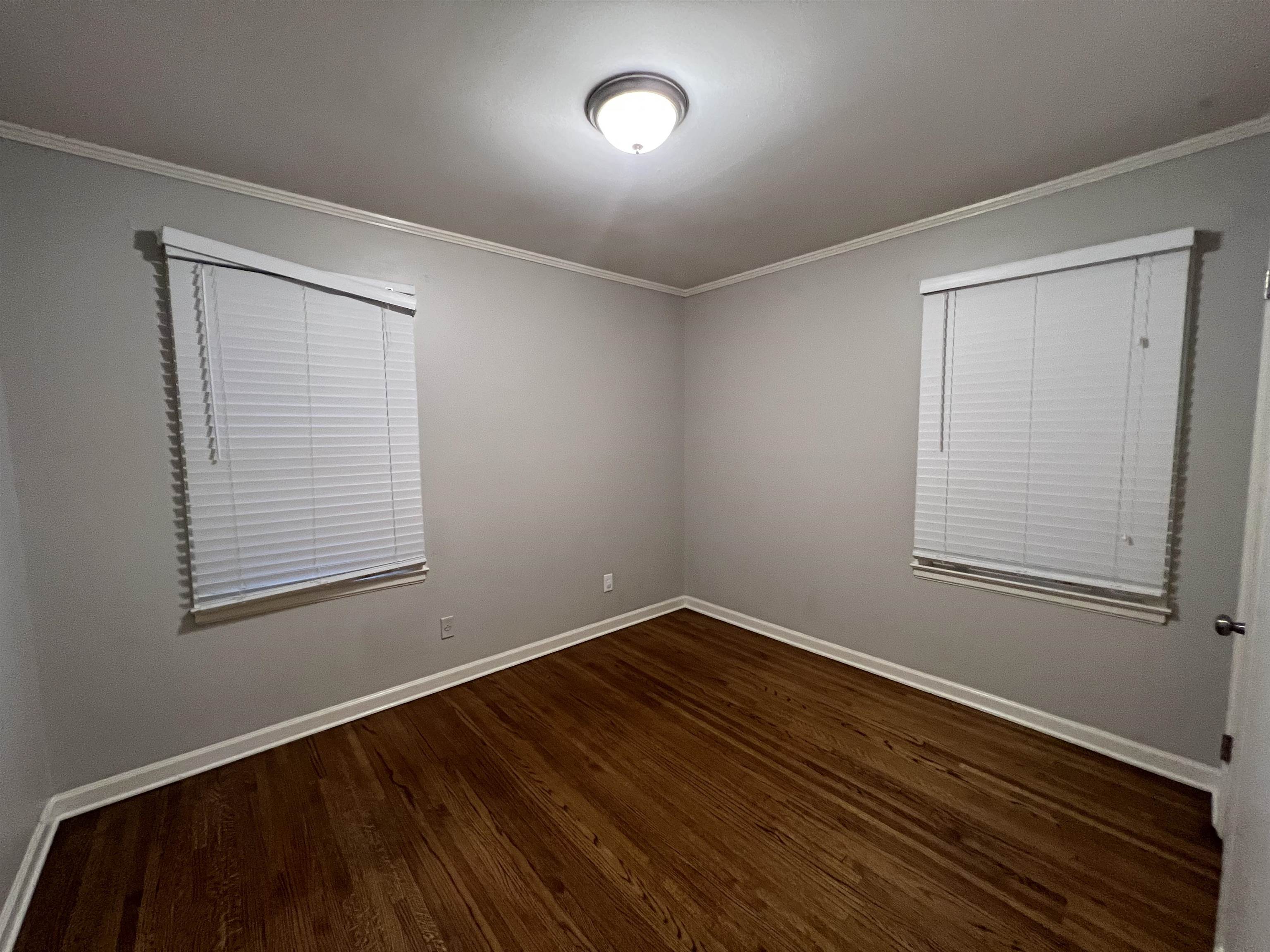 1653 Colonial Road Memphis, TN 38117 - Photo 12 of 15 an empty room with windows