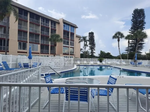 a view of a chairs and table on the terrace