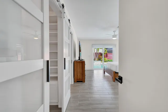 a view of a park with large trees