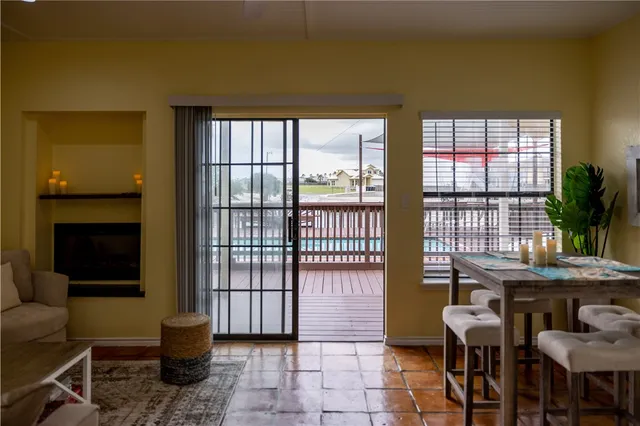a view of a livingroom with furniture and window
