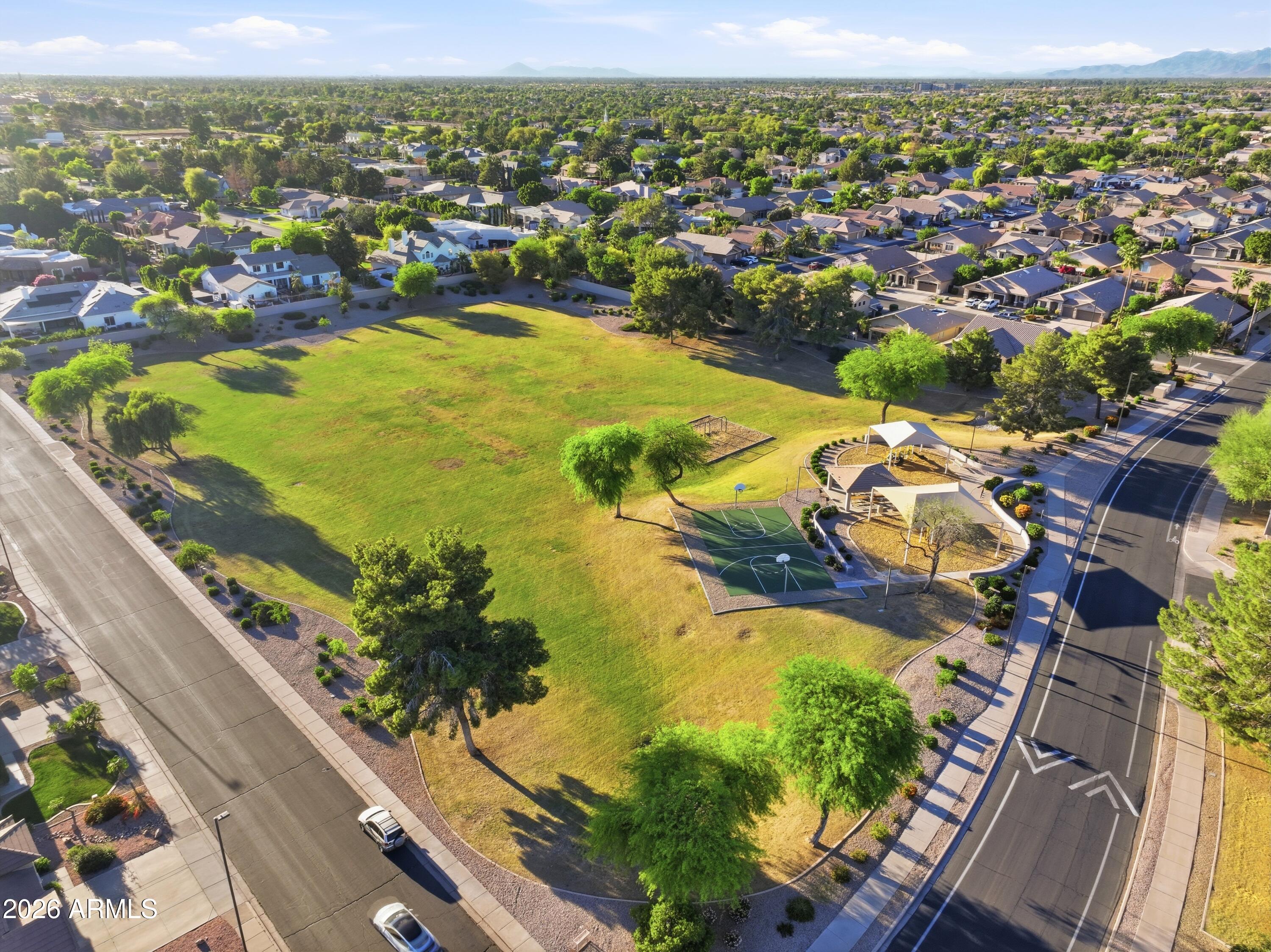 661 North Joshua Tree Lane Gilbert, AZ 85234 - Photo 42 of 47 an aerial view of residential houses with outdoor space