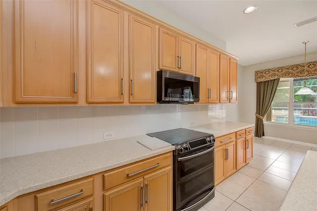 $880,000 | 5516 Garden Arbor Drive, Lutz, FL 33558