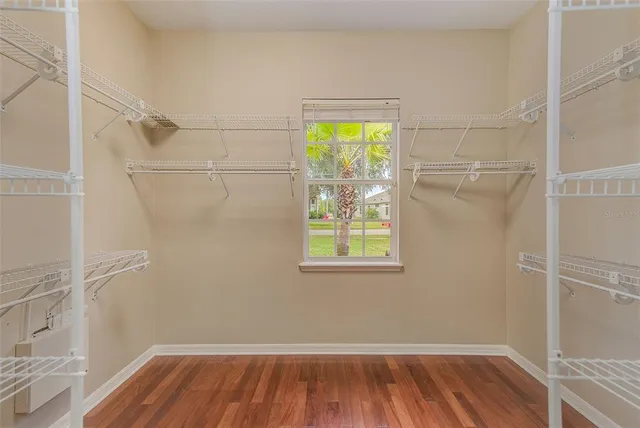 a bathroom with a shower and toilet