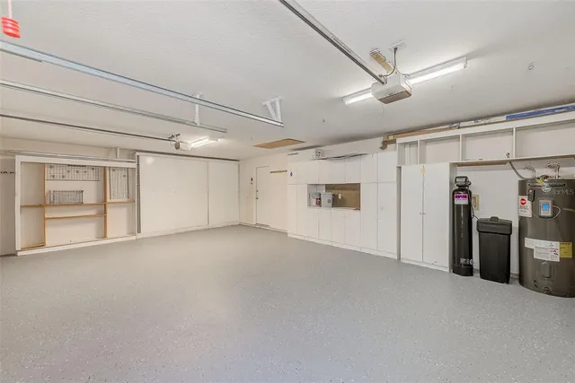 a view of yard with swimming pool and green space