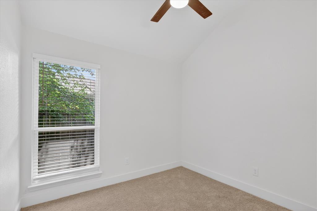 6021 Hartman Road Forest Hill, TX 76119 - Photo 23 of 27 an empty room with a window